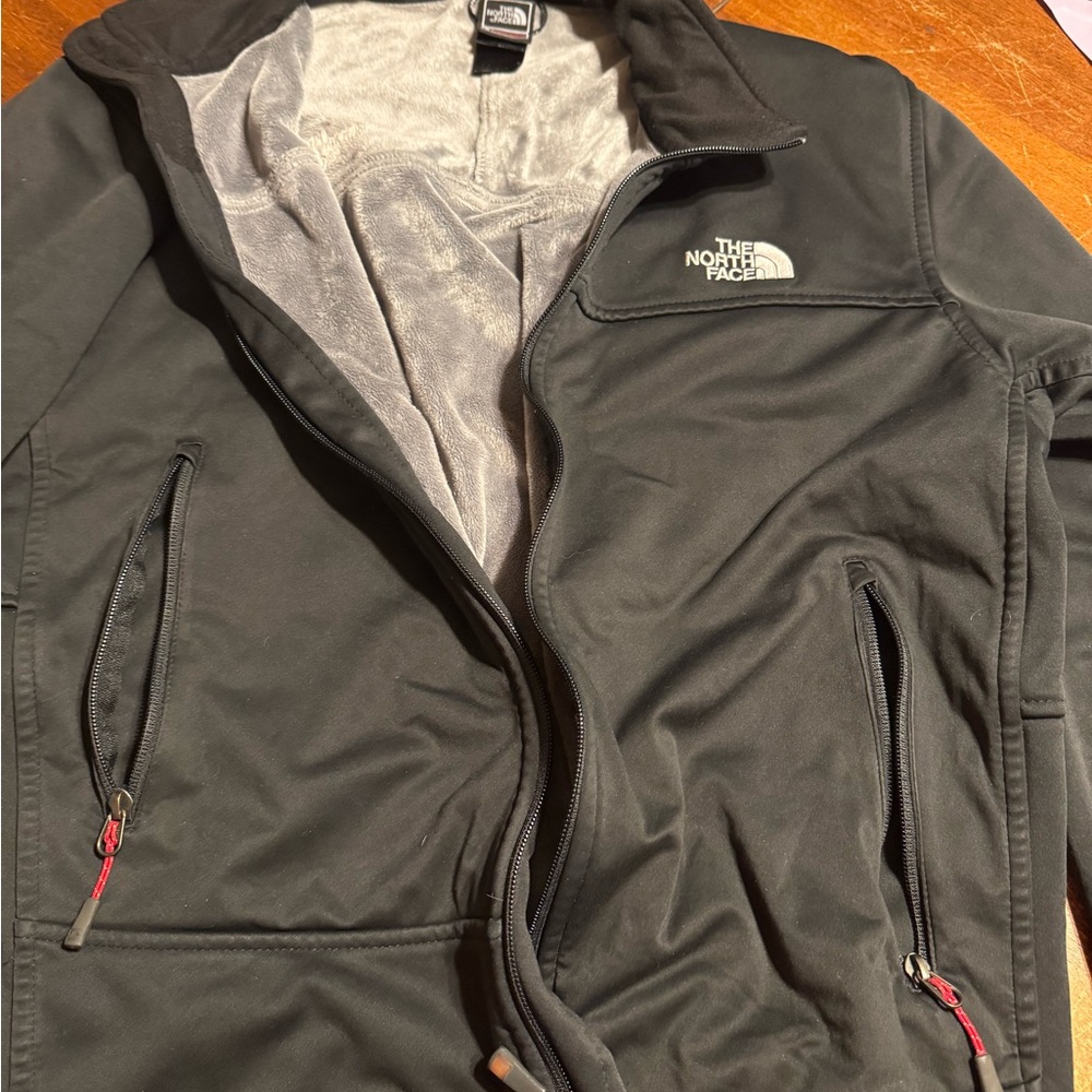 North face Summit series fleece lined jacket. Very warm. Little wear and tear